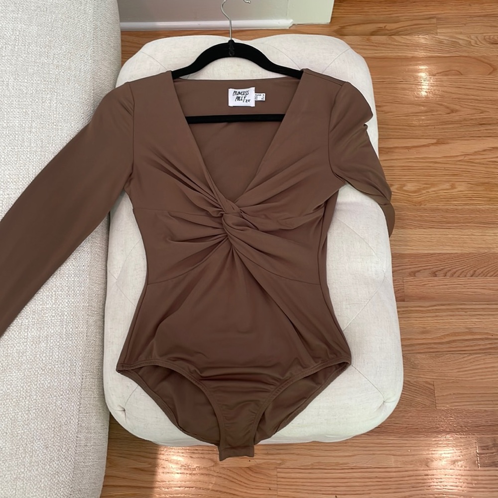 Brown Princess Polly long sleeve bodysuit.